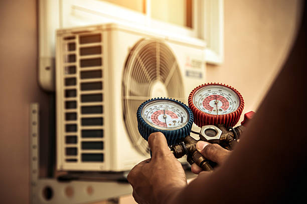 Professional Heat Pump Repair technician working in Tougaloo, MS